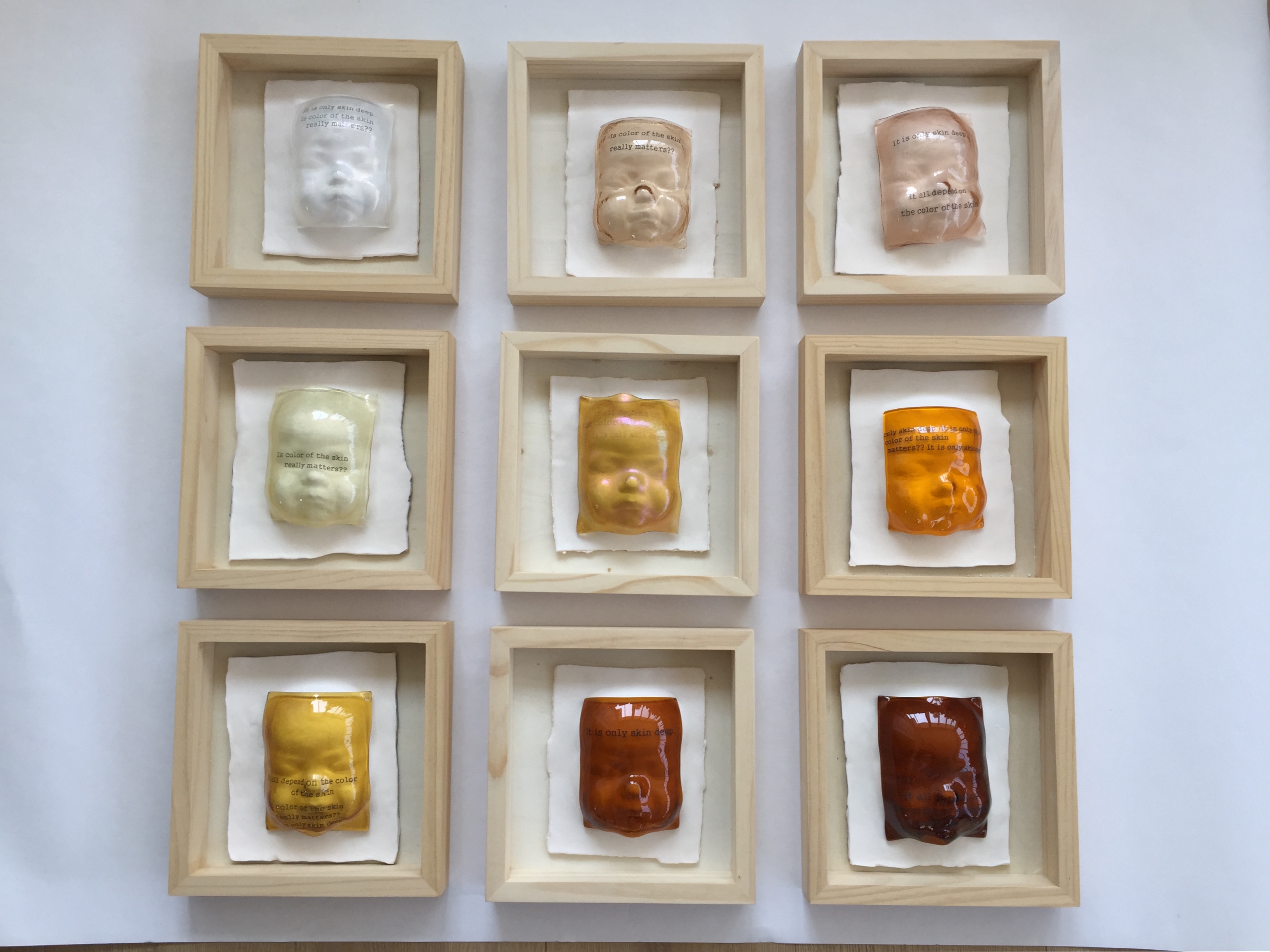 2) Yoonchung “yc” Park Kim-Does the color of the skin matter 2019 Porcelain and glass 28 x 28 x 2.jpg